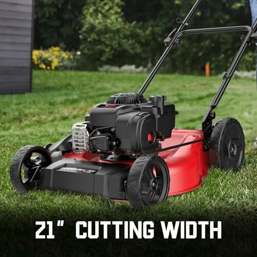 Red lawn mower with 21-inch cutting width on grass