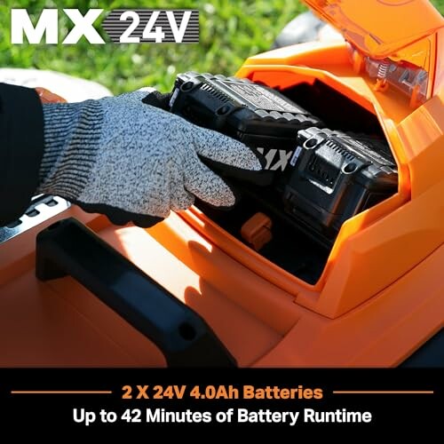 Person installing battery in lawnmower with text about battery runtime.