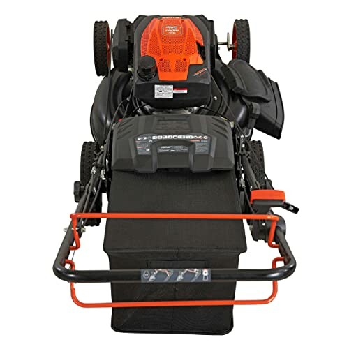 Front view of a black and orange lawn mower.