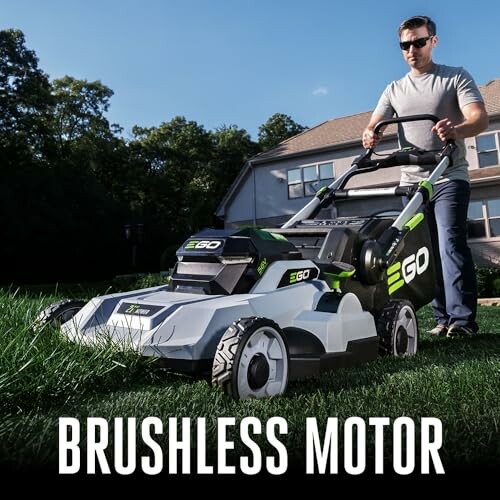 Person using EGO lawn mower with brushless motor on grass