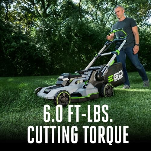 Man using EGO lawn mower in yard with 6.0 ft-lbs cutting torque