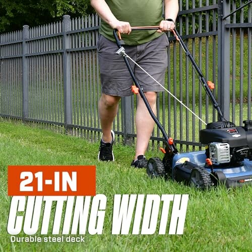 Person mowing lawn with 21-inch cutting width mower