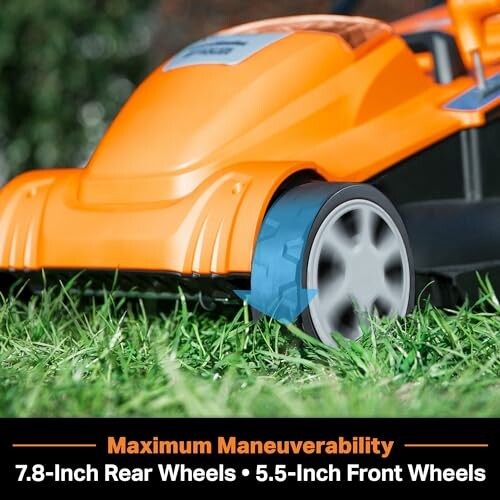 Close-up of an orange lawnmower with text about wheel size.