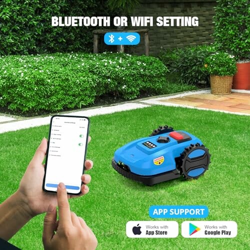 Person setting up smart lawn mower with phone app.